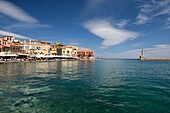 Greece, Crete, Chania, venetian port, pedestrian promenade in front of the lighthouse