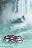 Canada, Ontario, Niagara Falls, boat tour in front of Niagara Falls