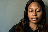 Studio Portrait of a Young Adult, Colored Woman born in the Caribbean. Tilburg, Netherlands.