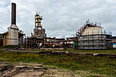 Huge, heavy steel production plant and industry terrain, producing various kinds of steel inside an CO2 Emitting and Exhausting Factory. IJmuiden, Netherlands.