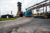 Huge, heavy steel production plant and industry terrain, producing various kinds of steel inside an CO2 Emitting and Exhausting Factory. IJmuiden, Netherlands.