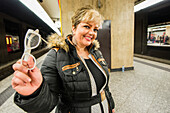 Brussels, Belgium. Blonde Iranian woman waiting for her International Train on a Brussels Central Station Underground Platform. Bruxxeles, Belgium