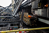 Huge, heavy steel production plant and industry terrain, producing various kinds of steel inside an CO2 Emitting and Exhausting Factory. IJmuiden, Netherlands.