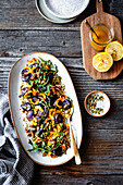 Quinoa salad with roasted delicata squash, beets, and arugula