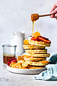 Citrus, almond, flour and poppy seed pancakes