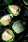 cut cabbage on a dark background