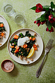 Cavolo nero and chickpea salad on a green background