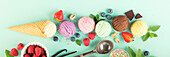 Flying scoops and ingredients on pastel light blue background. Summery minimal concept