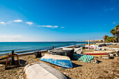 Fishing boats on Playa de la Cala beach, Estepona, Malaga, Costa del Sol, Andalusia, Spain, Europe