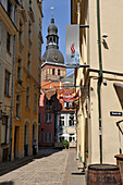 The 1221 restaurant in Jauniela Street with the Dome Cathedral (Riga Cathedral) bell tower in the background, Riga, Latvia, Baltic region, Europe