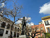 View of the Plaza de los Refinadores monument, featuring a life-size bronze sculpture of Don Juan Tenorio, a fictional character from Spanish literature, Seville, Andalusia, Spain, Europe