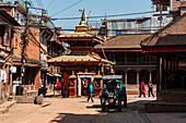 Small Hindu temple with golden roof in Bhaktapur, Kathmandu Valley, Nepal, Asia