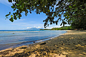 View from Pulisan beach to Paal Beach and headland, with Tangkoko mountain and reserve beyond, Pulisan, Minahasa Highlands, North Sulawesi, Indonesia, Southeast Asia, Asia