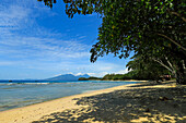 View from Pulisan beach to Paal Beach and headland, with Tangkoko mountain and reserve beyond, Pulisan, Minahasa Highlands, North Sulawesi, Indonesia, Southeast Asia, Asia