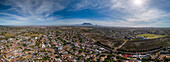 Aerial drone panoramic view of Northern residential suburbs in Cape Town, looking towards the south and Table Mountain, Cape Town, Western Cape, South Africa, Africa