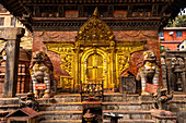 Golden gates of the holy Milarepa Shrine in Sankhu, Nepal, Asia