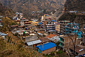 View over the roof tops of the Himalayan village of Syapru Besi on Pasang Lhamu Highway, Nepal, Asia