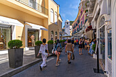 View of Clock Tower and cafe and shops on Via Roma, Capri Town, Isle of Capri, Campania, Italy, Mediterranean, Europe