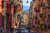 View of motocyclists and architecture on Via Francesco Girardi, Naples, Campania, Italy, Europe