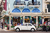 Traditional outdoor seating area of tavern with crowd and vintage decoration, Zakynthos, Ionian Islands, Greek Islands, Greece, Europe