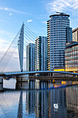 Media City UK, footbridge, swan in foreground, Salford Quays, Greater Manchester, England, United Kingdom, Europe