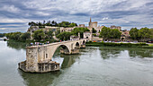 Aerial of the historic Bridge of Saint Benezet (Pont d'Avignon) with the historic city, Avignon, UNESCO World Heritage Site, Vaucluse, Provence-Alpes-Cote d'Azur, France, Europe