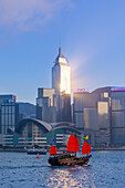 A Red Sail Junk in Hong Kong Harbour, Hong Kong, Special Administrative Region of the People's Republic of China, China, Asia