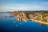 Drone aerial view of Costa Paradiso golden cliff landscape, Sardinia, Italy, Mediterranean, Europe