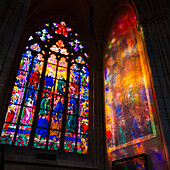 Colorful mosaic window and its reflection inside St. Vitus Cathedral, Prague Castle, UNESCO World Heritage Site, Prague, Czechia, Europe