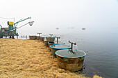 Fish tanks ready for fish harvest on Rozmberk Pond, UNESCO Biosphere, Trebon, Jindrichuv Hradec District, South Bohemian Region, Czech Republic (Czechia), Europe