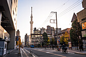 Tokyo Skytree in golden light of sunset in the streets of Tokyo, Honshu, Japan, Asia