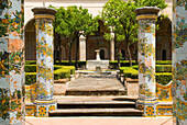 Cloister of the Clarisses, with the unique addition of majolica tiles in Rococo style, Santa Chiara complex, Naples, Campania region, Italy, Europe