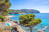 View of rocky shoreline and turquoise sea at Camp de Mar, Camp de Mar, Majorca, Balearic Islands, Spain, Mediterranean, Europe