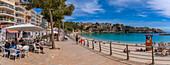 View of cafes and Platja de Portocristo beach, Porto Cristo, Majorca, Balearic Islands, Spain, Mediterranean, Europe