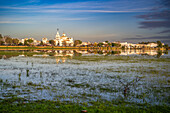 The Sanctuary of Virgen del Rocío beautifully reflected in the tranquil waters of Doñana Marsh, located in Almonte, Andalucía, Spain.