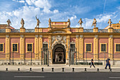 The north facade of the 18th-century Palacio de San Telmo with statues of illustrious sevillians by sculptor Antonio Susillo, located in Seville, Spain.