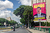 Plakatwände und Wandmalereien in den Straßen von Caracas, die für die Wahl von Präsident Nicolas Maduro in Venezuela werben