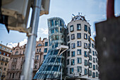 The Dancing House, or Ginger and Fred (Tancící dum), is the nickname given to the Nationale-Nederlanden building on the Rašínovo nábreží in Prague, Czech Republic.