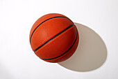 Overhead view of basketball on white background