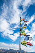 Prayer flags fluttering in wind atop Carbonate Mountain