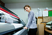 Portrait of woman working in printing studio