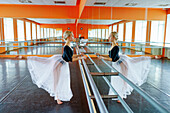 Ballerina practicing in ballet studio