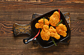 Deep-fried chicken pieces