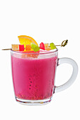 Hot pitahaya-orange drink with candied fruit