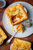 Chicken and lentil ragout with potatoes in puff pastry