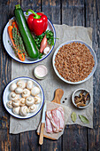 Ingredients for buckwheat with vegetables and bacon