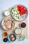 Ingredients for biryani with chicken and raisins