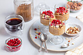 Mascarpone and coffee cream with nuts and pomegranate seeds