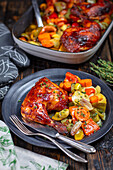 Baked chicken drumsticks with vegetables