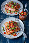 Salmon with tomato and avocado salsa